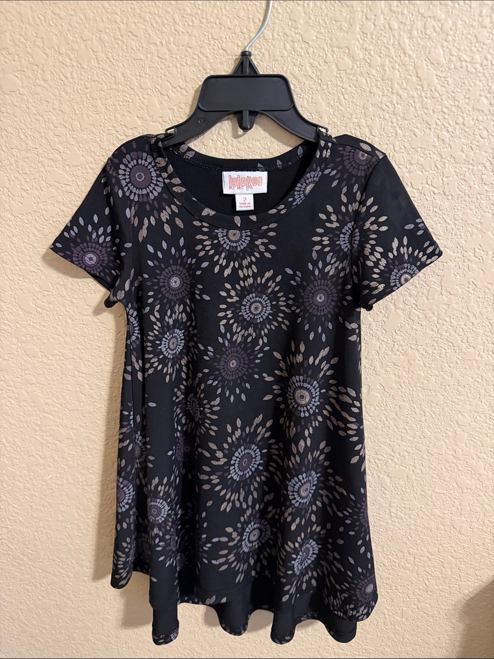 LuLaRoe Black Tee with Taupe and Purple Medallion Print
